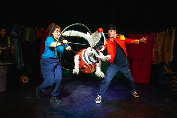 Photo by Tim Hills Puppet rabbit jumping through a hoop!